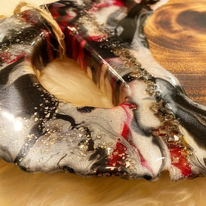 black and red oval charcuterie board
