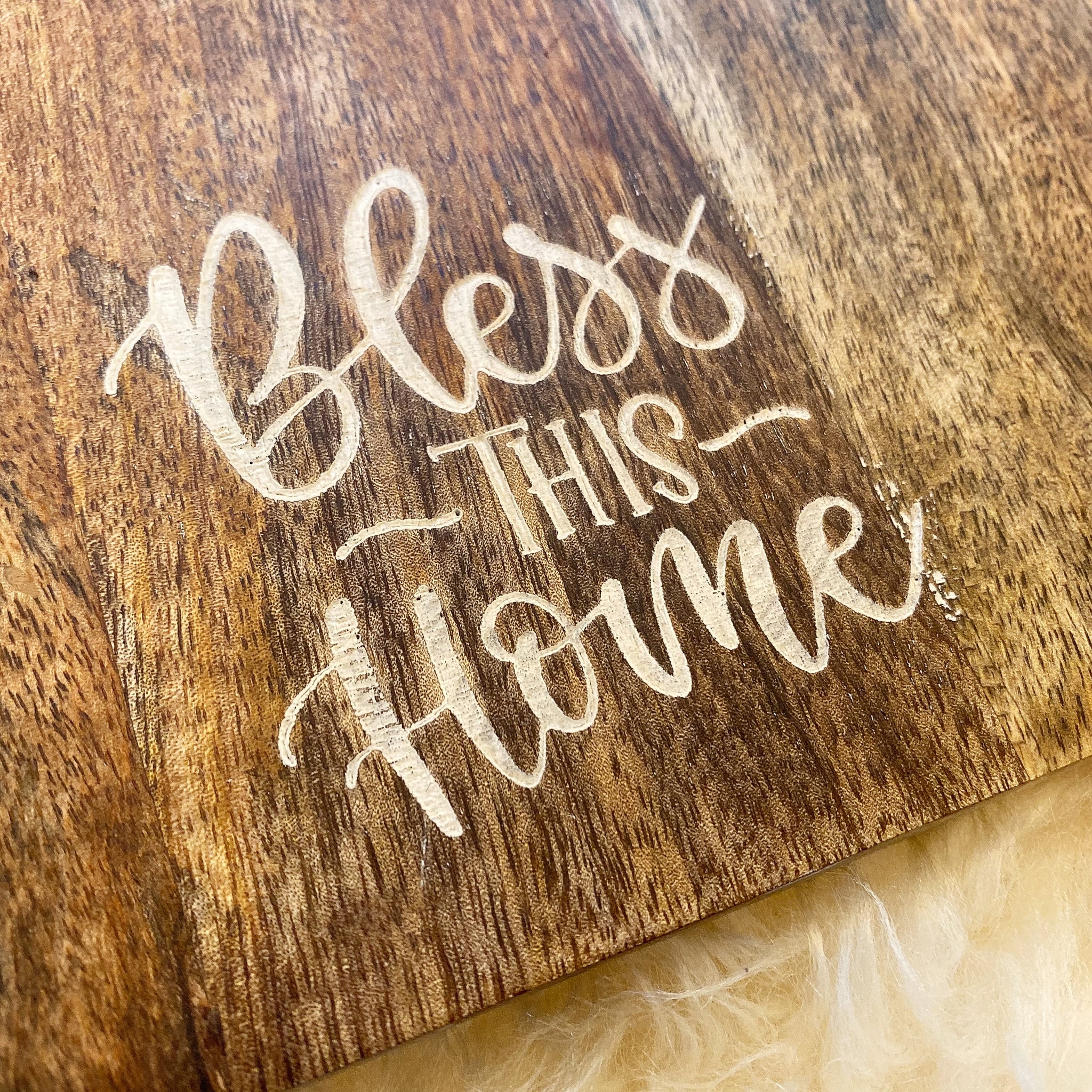 "bless this home" charcuterie board with resin and amber recycled glass