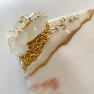 marble cheese board with golden feet